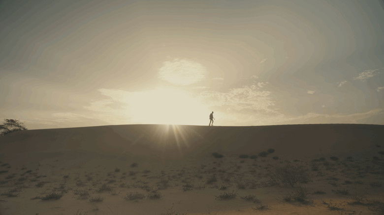 кадр из фильма In-Out