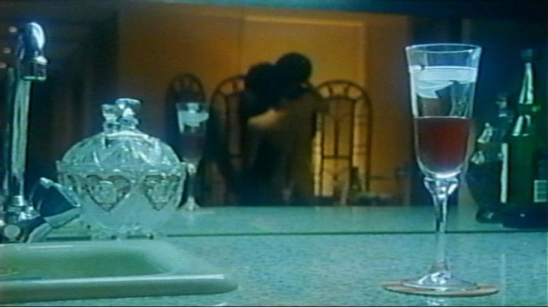 кадр из фильма 強請（ゆすり）