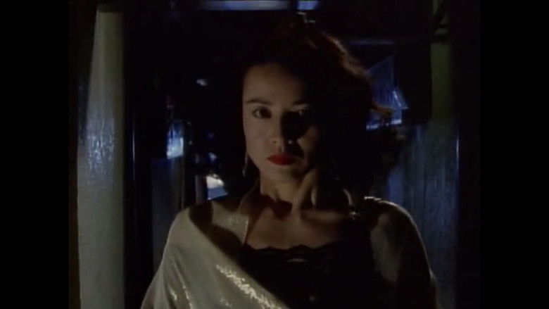 кадр из фильма XX 美しき標的