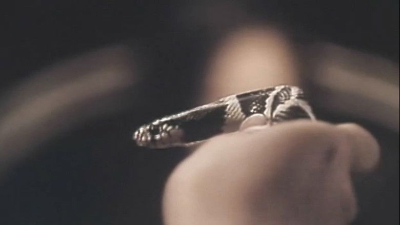 кадр из фильма 地下鉄連続レイプ ＯＬ狩り