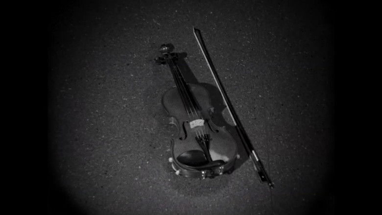 кадр из фильма The String That Binds Me