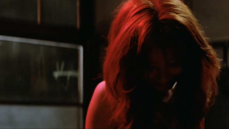 кадр из фильма 赫い髪の女