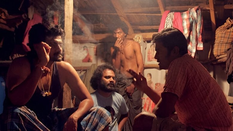 кадр из фильма மூடர் கூடம்