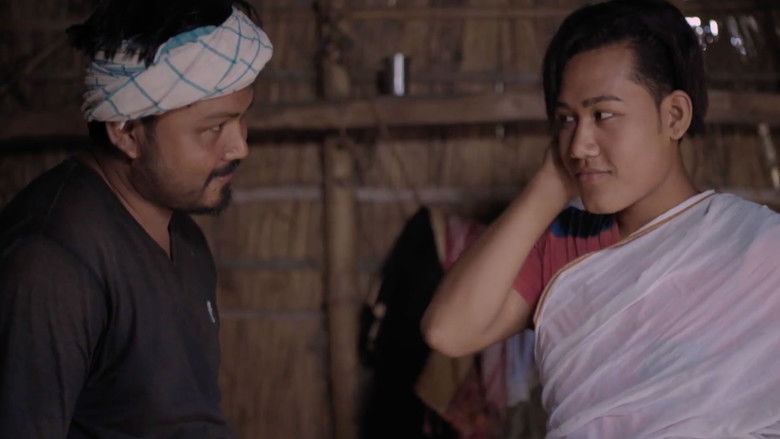 кадр из фильма Jonaki Porua