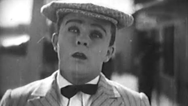 кадр из фильма His Angel Child