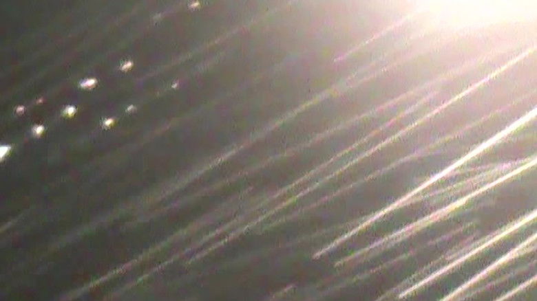 кадр из фильма rainy streets