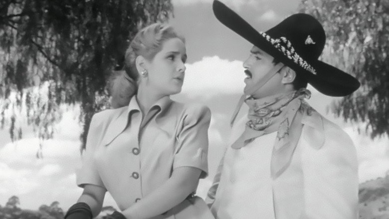 кадр из фильма El charro y la dama