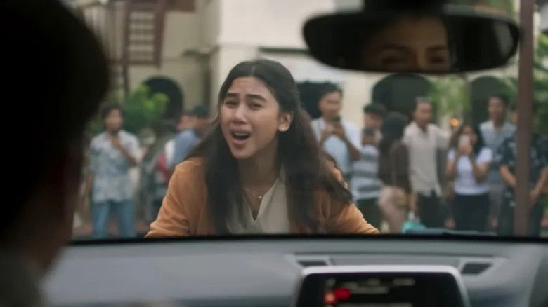 кадр из фильма Sosok Ketiga: Lintrik