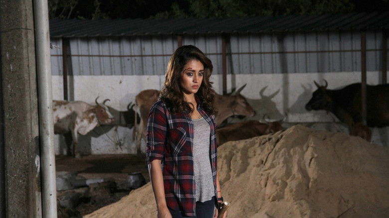 кадр из фильма கர்ஜனை