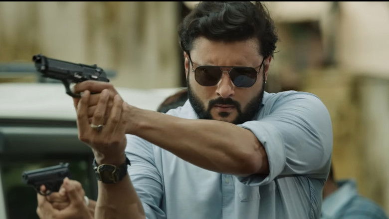 кадр из фильма କର୍ମ