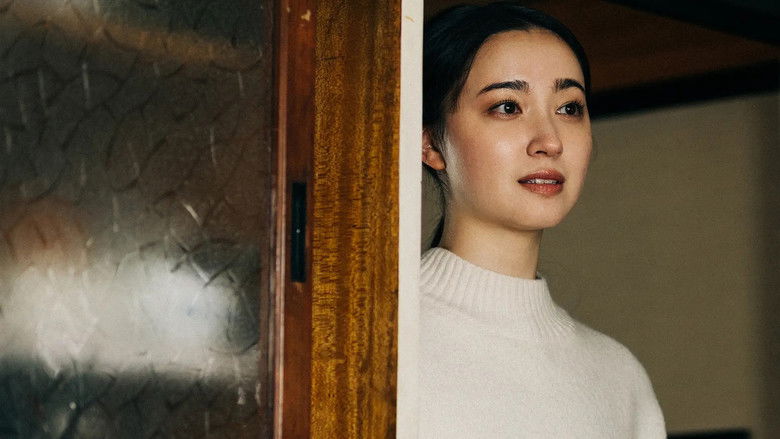 кадр из фильма 消えない灯り