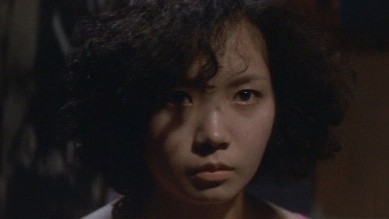 кадр из фильма 百恵の唇　愛獣