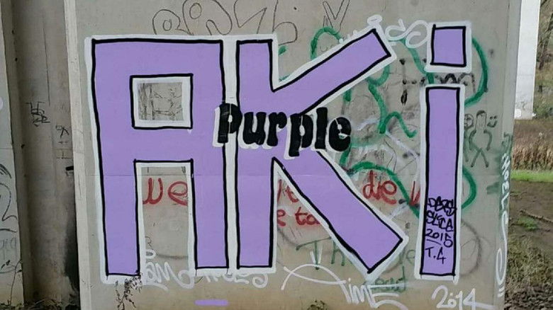 кадр из фильма The Man Who Squeezes Muscles: Searching for Purple Aki