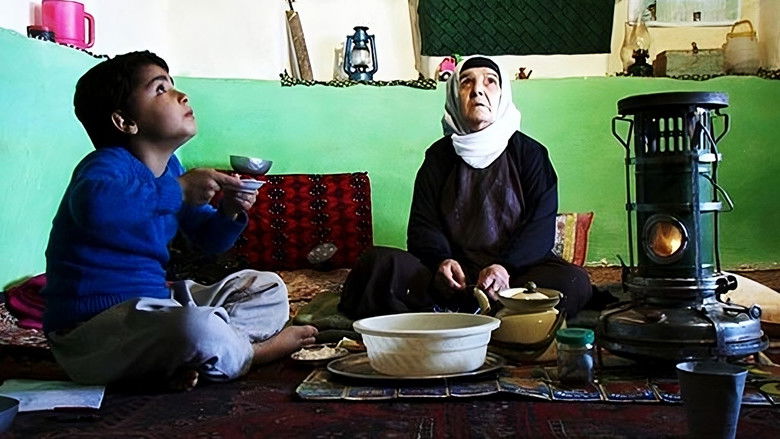 кадр из фильма می خورد بر بام خانه