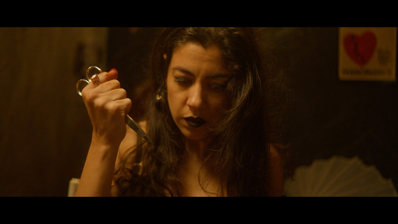 кадр из фильма Apotemnofilia