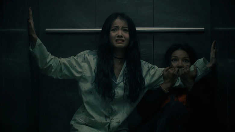 кадр из фильма Thang Máy