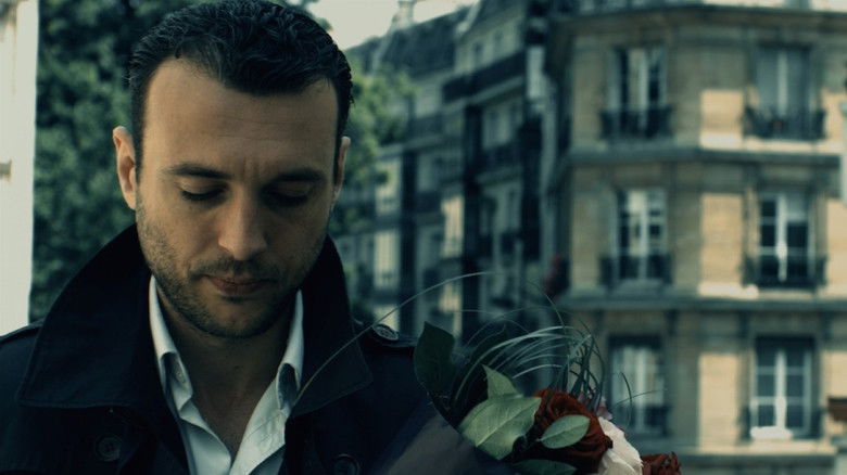 кадр из фильма L'Homme qui Aimait les Fleurs