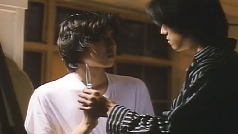 кадр из фильма 熱い吐息