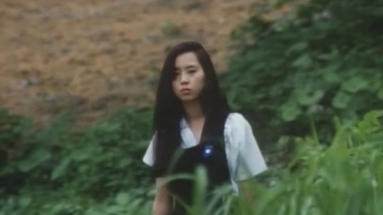 кадр из фильма 女高生 夏ひらく唇