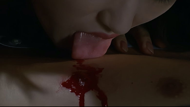кадр из фильма 愛獣　赤い唇