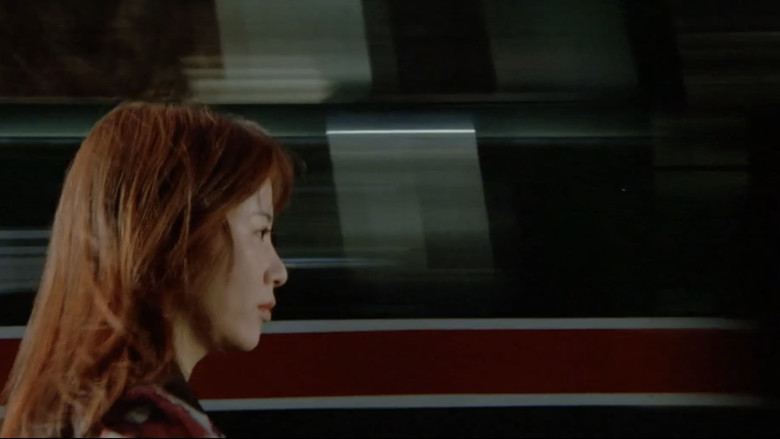 кадр из фильма 赫い髪の女