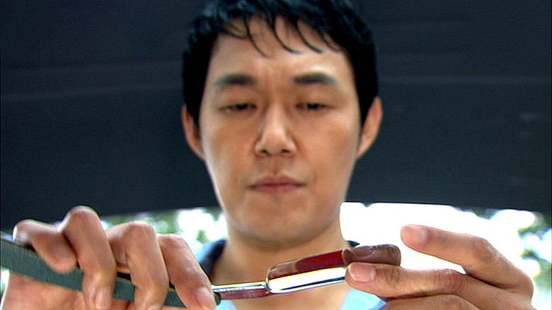 кадр из фильма 칼잡이 이발사