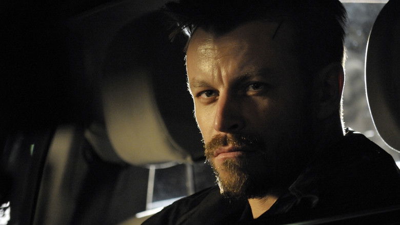 кадр из фильма Служитель зла