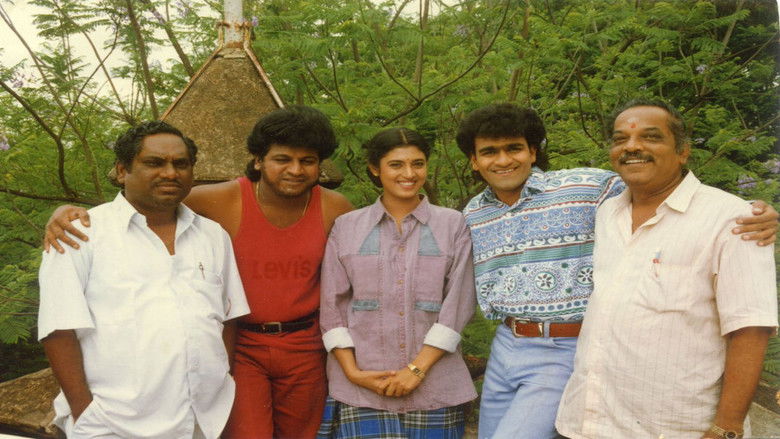 кадр из фильма Ibbara Naduve Muddina Aata