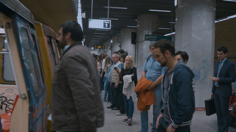 кадр из фильма Coborâm la prima