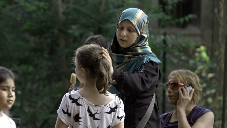 кадр из фильма Porto il velo adoro i Queen