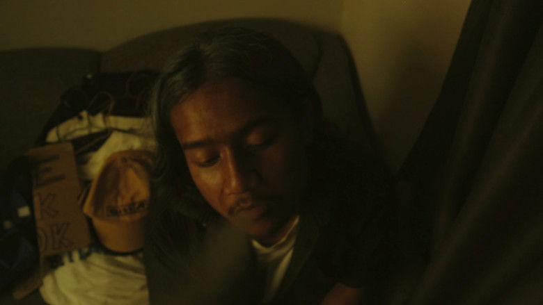 кадр из фильма Hangat Selimut Nadi