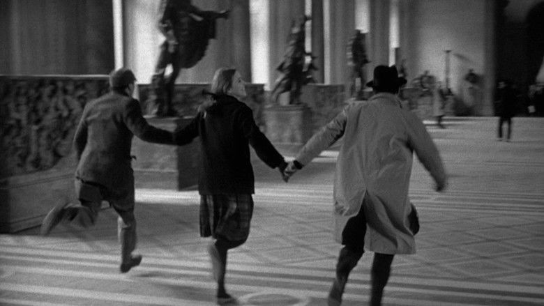 кадр из фильма Банда аутсайдеров