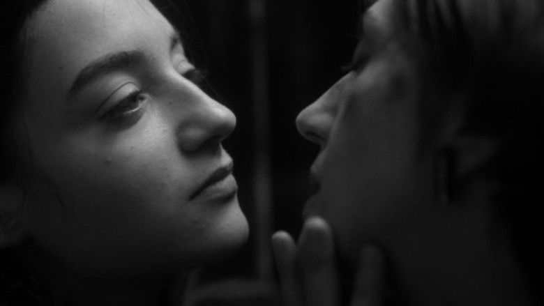 кадр из фильма Два человека обмениваются слюной