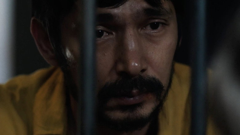 кадр из фильма Призрак в клетке