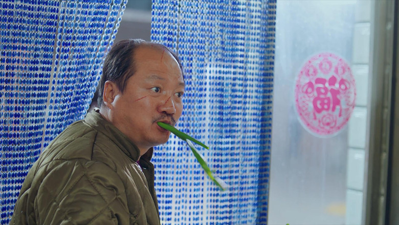 кадр из фильма 东北喜事之山炮扶上墙