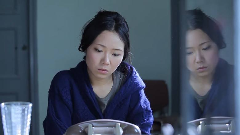 кадр из фильма 打錯