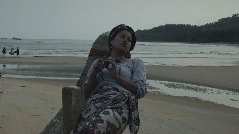 кадр из фильма ORU KARAKKUM MATTANEKANGALKKUMIDAYIL