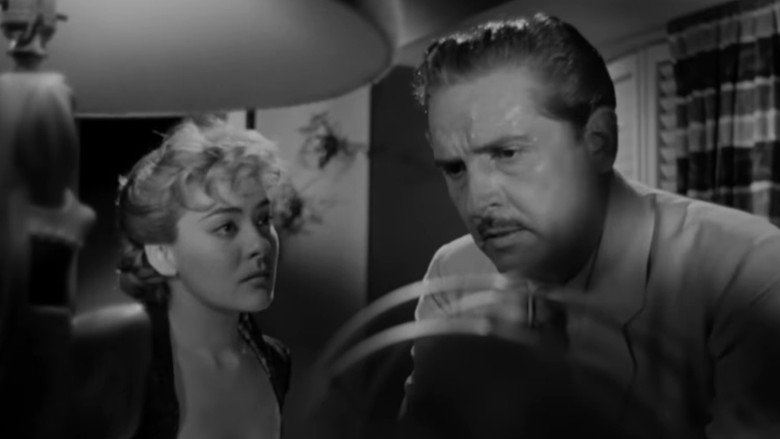 кадр из фильма Un extraño en la escalera