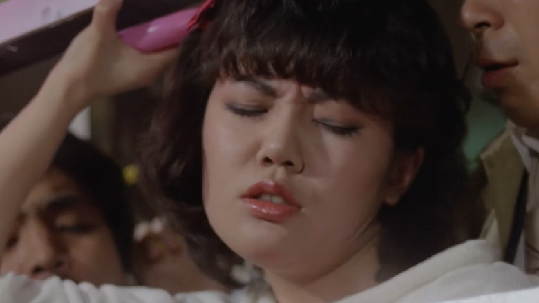 кадр из фильма 痴漢電車　いたずらな指