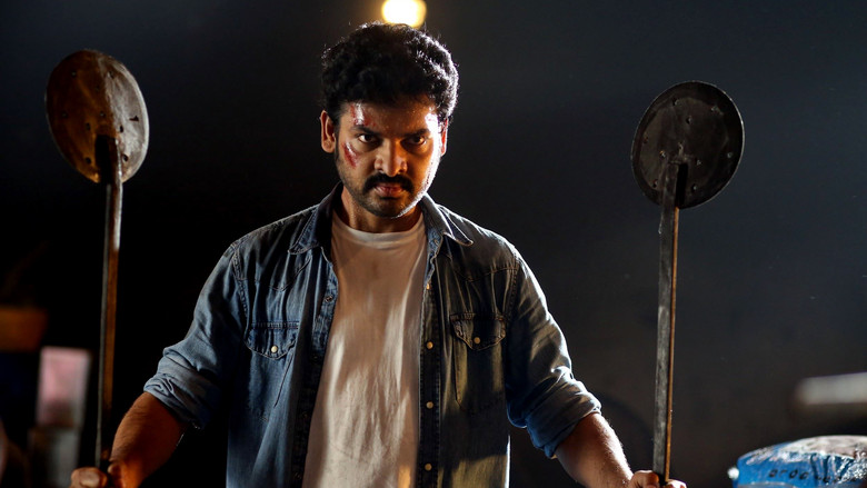 кадр из фильма துடிக்கும் கரங்கள்