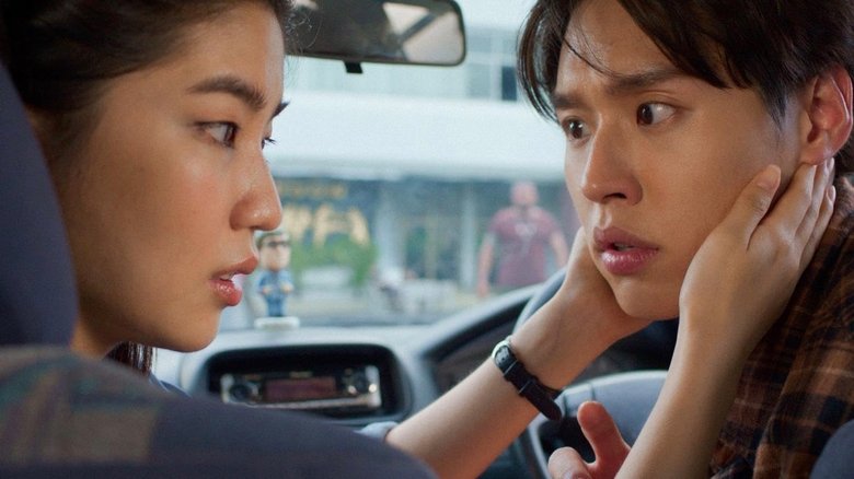 кадр из фильма ซองแดงแต่งผี