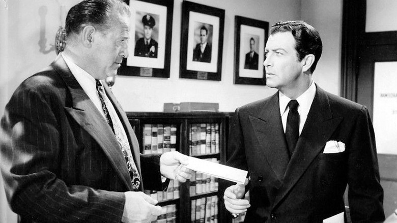 кадр из фильма Полицейский-мошенник