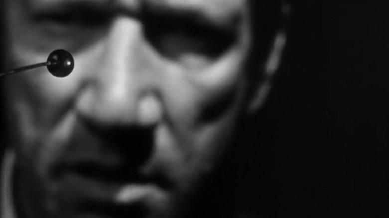 кадр из фильма Я хороню живого