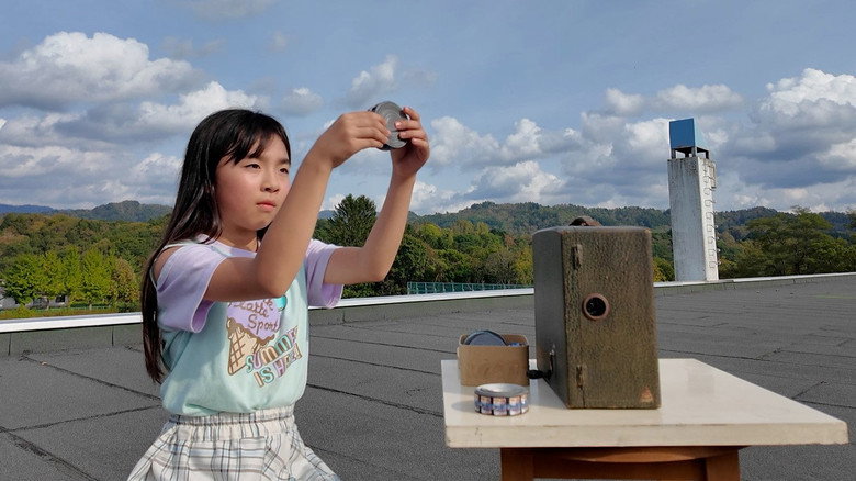 кадр из фильма 屋上映画館の子供たち