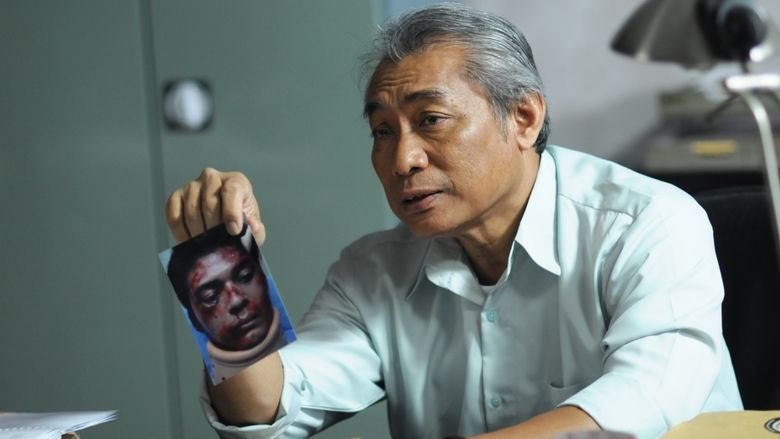 кадр из фильма Рейд 2