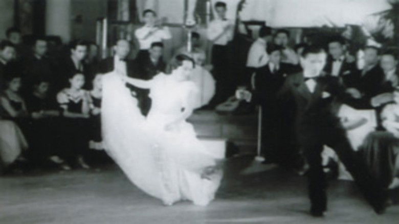 кадр из фильма 舗道の囁き