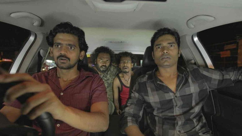 кадр из фильма மூடர் கூடம்