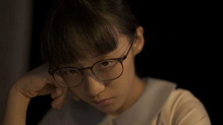 кадр из фильма 腦殘郵寄