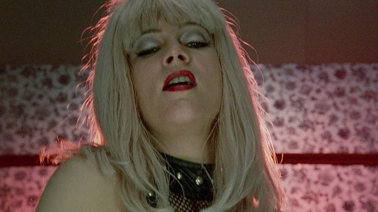 кадр из фильма Преступление на почве страсти