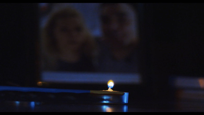 кадр из фильма A Candle in the Dark